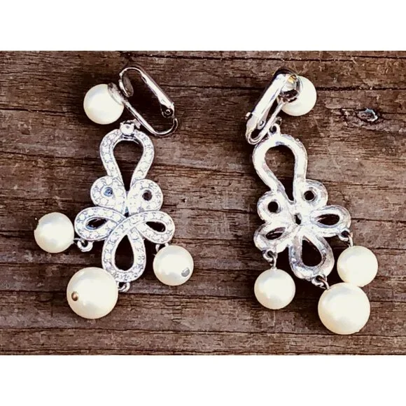 Silver Tone Bow Chandelier Clip On Earrings with Faux Pearls and Rhinestones - Picture 4 of 4